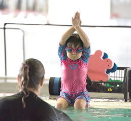 swim-school-2 Child learning how to swim