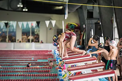 Swim team student ready to dive