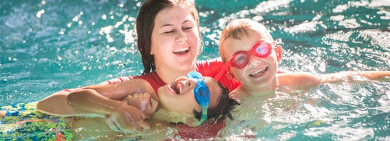 Swim instructor with students
