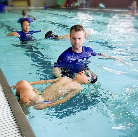 Children learning to swim