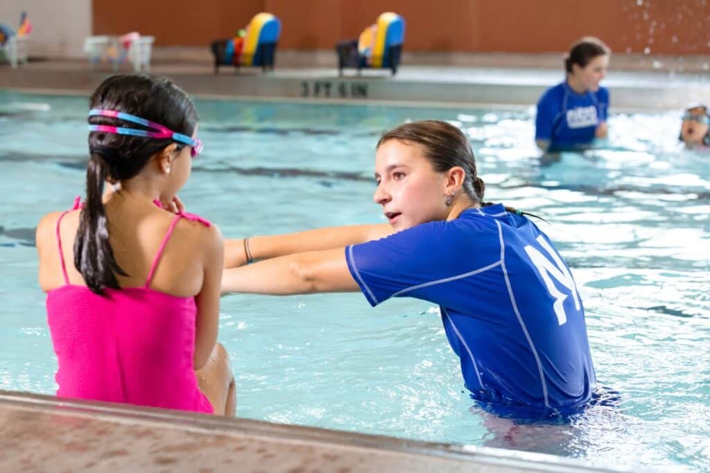 nitro swim lessons instuctor and student